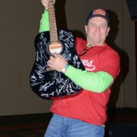 Guitar winner at the 2021 Bluegrass Christmas in the Smokies - photo © Bill Warren
