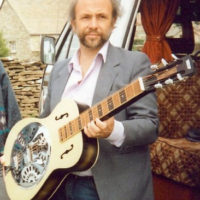 Pat Francis taking possession of a newly built resophonic guitar