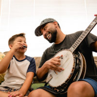 Snap Jackson jamming with his son