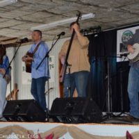 Caroline Owens sings with Deeper Shade of Blue at the 2022 Palatka Bluegrass Festival - photo © Bill Warren
