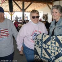 Nancy Bryan won this beautiful quilt at the Spring 2022 Palatka Bluegrass Festival - photo © Bill Warren
