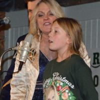 Molly gets to sing with Rhonda Vincent at the Spring 2022 Palatka Bluegrass Festival - photo © Bill Warren