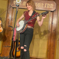 Molly Tuttle takes a turn on banjo at The Station Inn (3/28/22) - photo by Jayne Tuttle Cooper