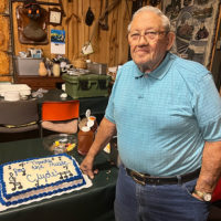 Clyde Maness with his Alan Perdue Award cake