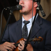 Nathan Aldridge with Russell Moore & IIIrd Tyme Out at the Spring 2022 Gettysburg Bluegrass Festival - photo by Frank Baker