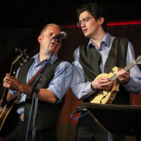 Jacob Wright and Evan Wilson with Larry Sparks at the May 2022 Gettysburg Bluegrass Festival - photo by Frank Baker