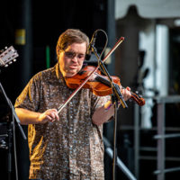 Michael Cleveland with Béla Fleck at DelFest 2022 - photo by Marc Shapiro Media