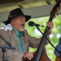 Garry Ollis, bass player for Tim White and Troublesome Hollow at the 50th Dr. Ralph Stanley Hills of Home Memorial Day Bluegrass festival. Coeburn, VA. Thursday May 26th, 2022 - photo by Jeromie Stephens