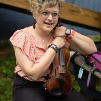 Po' Ramblin' Boys fiddle player, Laura Orshaw at the 50th Dr. Ralph Stanley Hills of Home Memorial Day Bluegrass festival. Coeburn, VA. Thursday May 26th, 2022 - photo by Jeromie Stephens