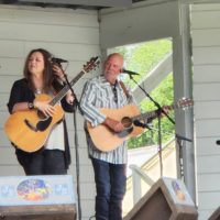 Donna Ulisse and husband Rick Stanley at the 2022 Jenny Brook Bluegrass Festival - photo by Ted Lehmann