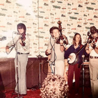 Boot Hill at Fiddler's Cove (circa 1975): Gary Brown, JB Prince, Vassar Clements, Louisa Branscomb, Bobby Hicks, Steve Block (hidden), and Sam Sanger - photo by Lin Willis