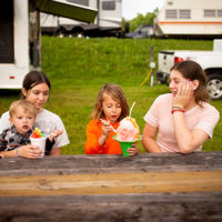 Shaved ice, always a treat at the 50th Dr. Ralph Stanley Hills of Home Memorial Day Bluegrass festival in Coeburn, VA. Friday May27th, 2022 - photo by Jeromie Stephens​