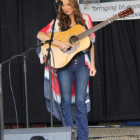 Caroline Owens at the 2022 Cherokee Bluegrass Festival - photo by Laura Tate Photography