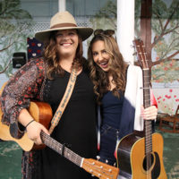 Katelyn Ingardia and Caroline Owens at the 2022 Cherokee Bluegrass Festival - photo by Laura Tate Photography