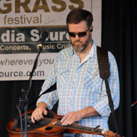 Travis Tucker with Backline at the 2022 Cherokee Bluegrass Festival - photo by Laura Tate Photography