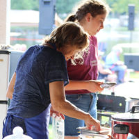 Cooking up a storm at the 2022 Cherokee Bluegrass Festival - photo by Laura Tate Photography