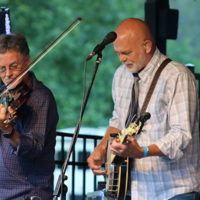 Mike Hartgrove and Sammy Shelor with Lonesome River Band at the 2022 Cherokee Bluegrass Festival - photo by Laura Tate Photography