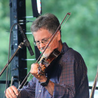 Mike Hartgrove with Lonesome River Band at the 2022 Cherokee Bluegrass Festival - photo by Laura Tate Photography