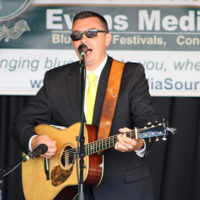 Corey Zink at the 2022 Cherokee Bluegrass Festival - photo by Laura Tate Photography