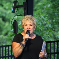 MC Sherry Boyd at the 2022 Cherokee Bluegrass Festival - photo by Laura Tate Photography