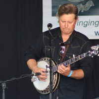 Eric Gibson at the 2022 Cherokee Bluegrass Festival - photo by Laura Tate Photography