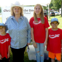Lorraine Jordan at the 2022 Willow Oak Bluegrass Festival with kids that perform at her Coffee House (Jacob, JoJo, and Landon Murphy) - photo by Gary Hatley