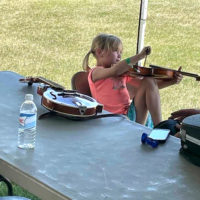 Kids Instrument Discovery Zone at the 2022 Pickin' On The Plains festival - photo by Cynthia Marcotte Stammer