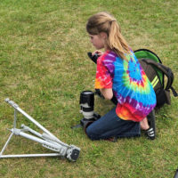 Young photographer at the 2022 Jenny Brook Bluegrass Festival - photo by Ted Lehmann