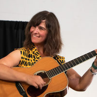 Avril Smith of Della Mae at the 2022 Grey Fox Bluegrass Festival - photo © Tara Linhardt