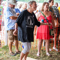 Della Mae fan boogeying down at the 2022 Grey Fox Bluegrass Festival - photo © Tara Linhardt