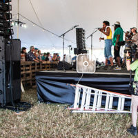 Grey Fox photographer capturing Gangstagrass on Catskill Stage at the 2022 Grey Fox Bluegrass Festival - photo © Tara Linhardt