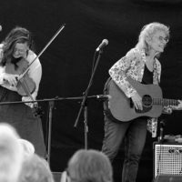 Ellie Hakanson and Kathy Kallick at the 2022 High Mountain Hay Fever Bluegrass Festival - photo by Vicki Quarles