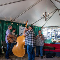 Micheal Cleveland & Flamekeeper warming up backstage at the 2022 Grey Fox Bluegrass Festival - photo © Tara Linhardt