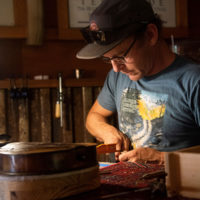 Working hard in the luthiery class at the 2022 RockyGrass Academy - photo by Ashley Cawthorn
