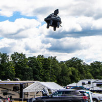 Starting out with the famous campground flying pig...before it blew away Thursday afternoon at the 2022 Grey Fox Bluegrass Festival - photo © Tara Linhardt