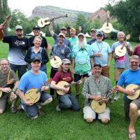 Luthier class showing off their flat top mandolins at the 2022 RockyGrass Academy - photo by Maya Benko