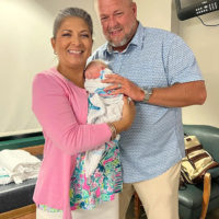 Wren and Randy Spencer with their first grand baby, Audria