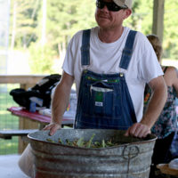 Pat offered his fresh purple hull crowder peas at Trade Day during Bluegrass Jamboree at the August '22 Bluegrass Jamboree - photo by Kristin Yarbrough