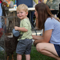 Kim’s rooster found a new home during a special Trade Day at the August '22 Bluegrass Jamboree - photo by Kristin Yarbrough