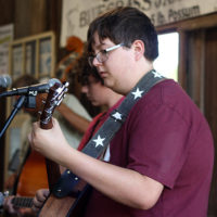 Aaron Garvich and Sam Battles on the open stage at the August '22 Bluegrass Jamboree - photo by Kristin Yarbrough