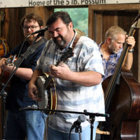 Another Town headlines Pine Mountain Bluegrass Jamboree, August 27, 2022, with Adam Duke on guitar, Anthony Bailey on banjo, Russell Rollo on bass - photo by Kristin Yarbrough