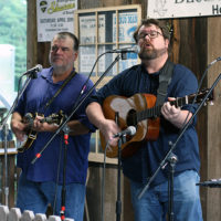 Another Town’s Stacy Richardson and Adam Duke at the August '22 Bluegrass Jamboree - photo by Kristin Yarbrough