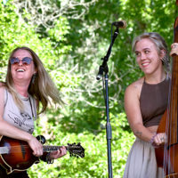 Eve Panning and Emma Rose with Big Richard at RockyGrass 2022 - photo by Kevin Slick
