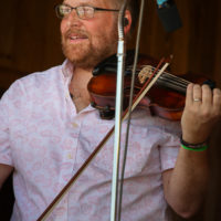 Adam Haynes with The Grascals at the summer 2022 Gettysburg Bluegrass Festival - photo by Frank Baker