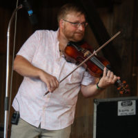 Adam Haynes with The Grascals at the summer 2022 Gettysburg Bluegrass Festival - photo by Frank Baker