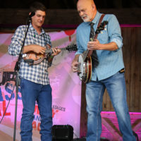 Adam Miller and Sammy Shelor with Lonesome River Band at the summer 2022 Gettysburg Bluegrass Festival - photo by Frank Baker