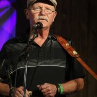 Fred Travers with Seldom Scene at the 2022 summer Gettysburg Bluegrass Festival - photo by Frank Baker
