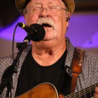 Dudley Connell with Seldom Scene at the 2022 summer Gettysburg Bluegrass Festival - photo by Frank Baker
