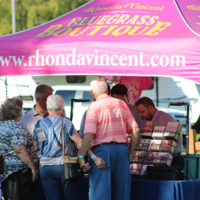 Rhonda Vincent's merch tent at the McDowell County Roundup (8/12/22) - photo by Laura Tate Photography
