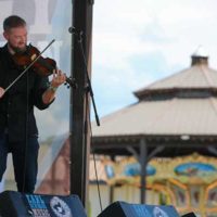 Tim Gardner with Unspoken Tradition at the inaugural Earl Scruggs Music Festival, Labor Day 2022 - photo by Bryce Lafoon